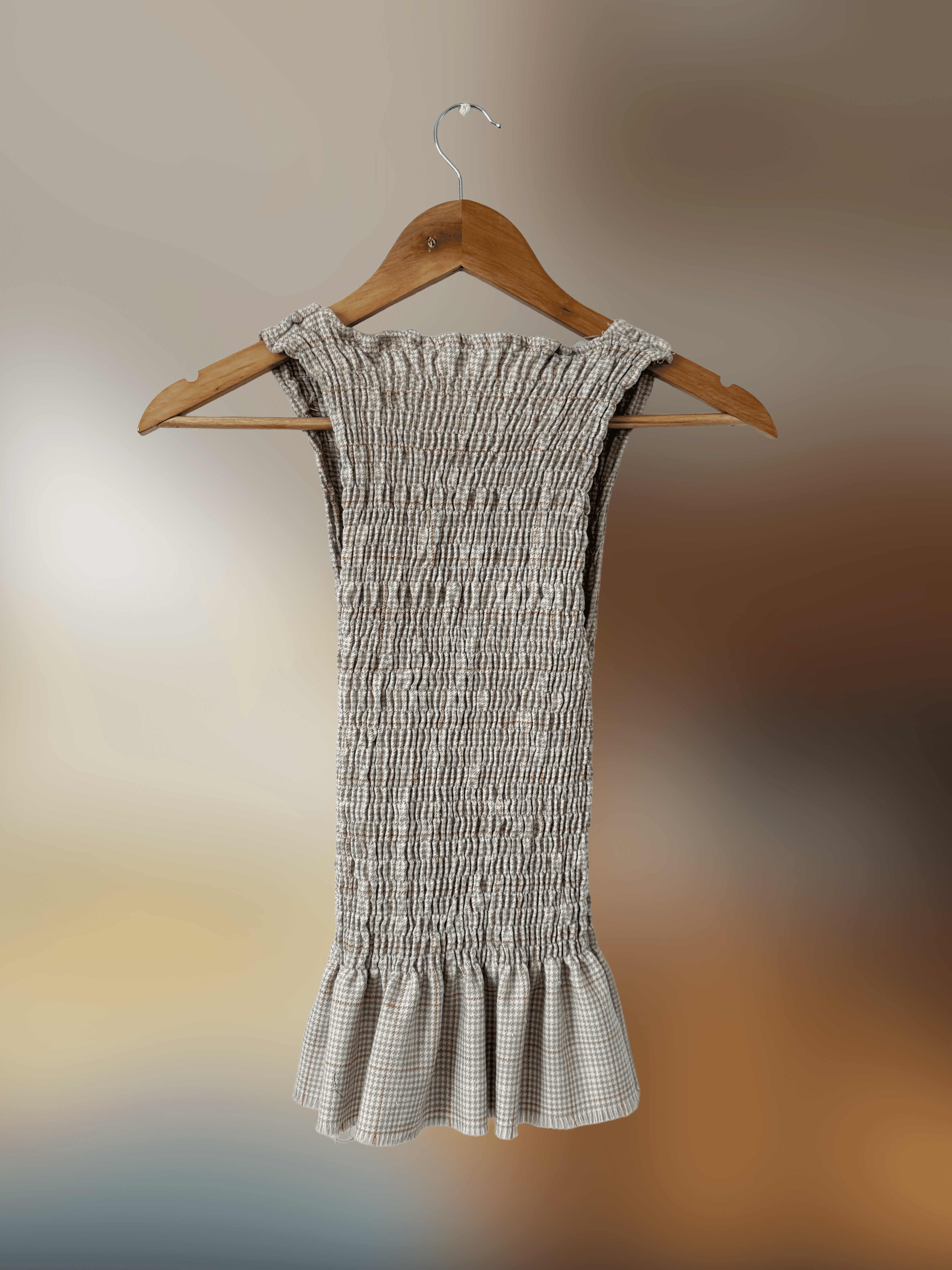 Back of rushed cream top