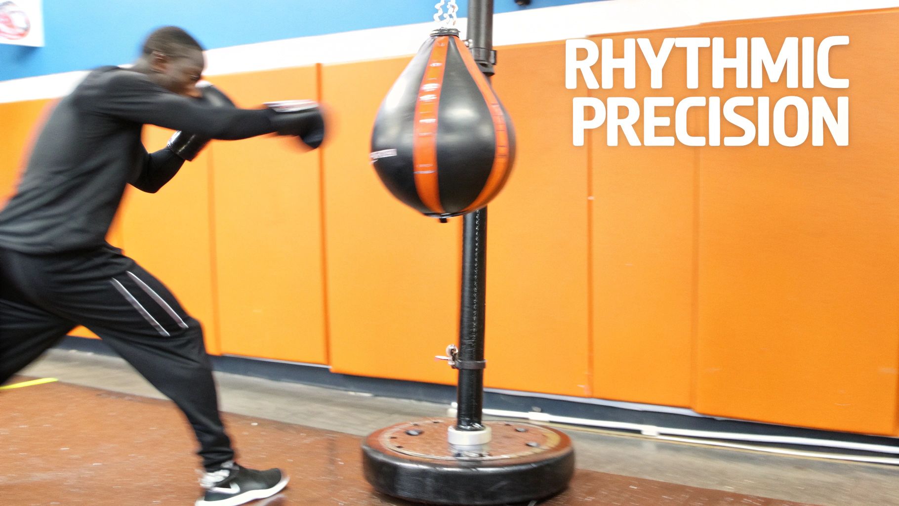 A person hitting a speed bag with precision and focus, demonstrating hand-eye coordination.