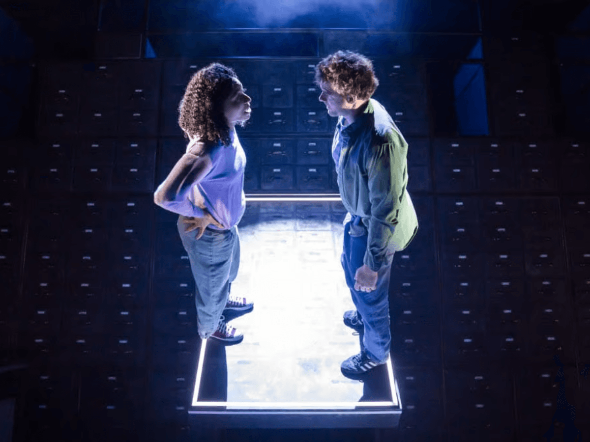 Lost Atoms at London's Lyric Hammersmith  poster with two faces reflected in broken glass