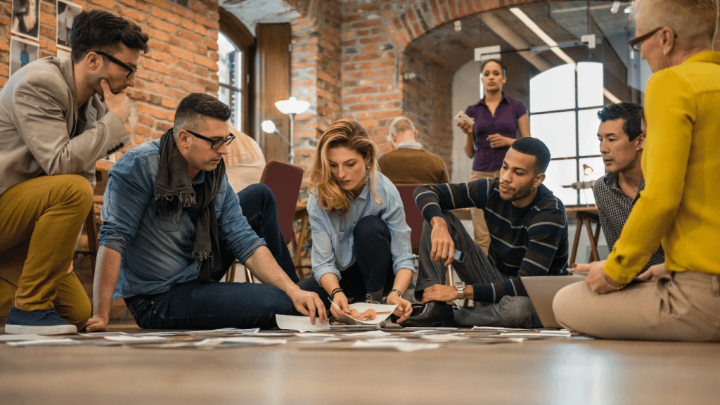 A group of AI marketing personnel discussing future campaigns and how to maximize AI in marketing