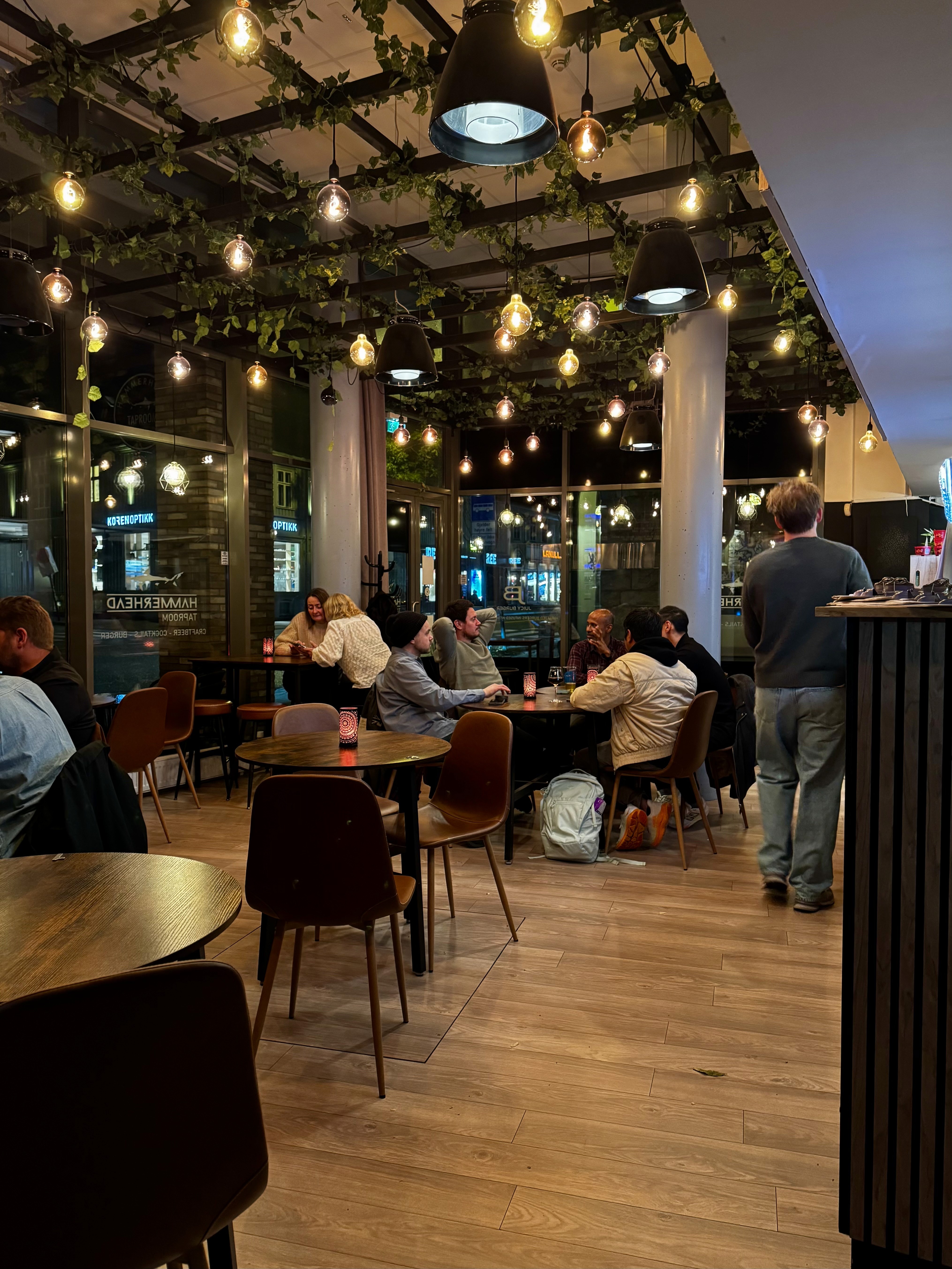 Barista in mask preparing coffee with moka pot