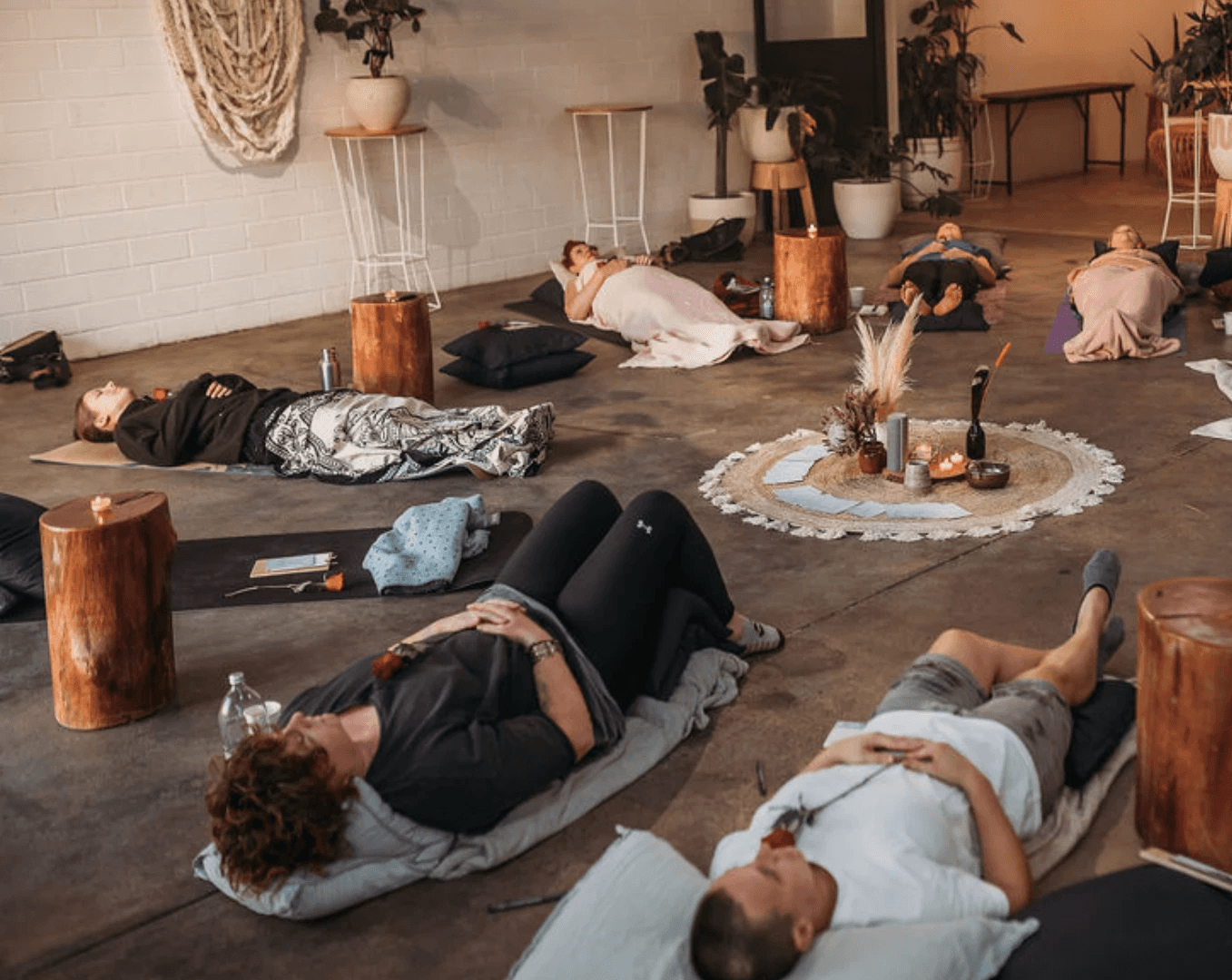 A couple stands closely in an intimate embrace.