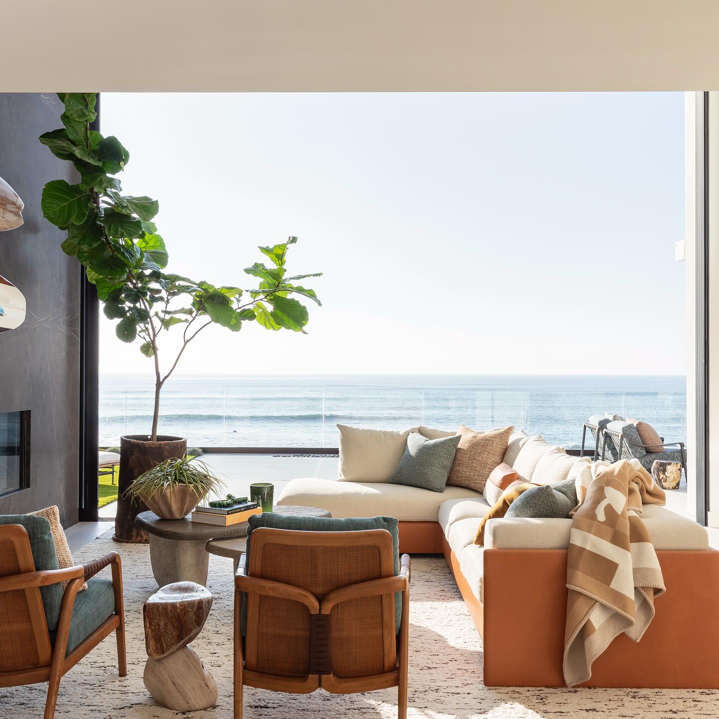 Living room with large window with ocean view
