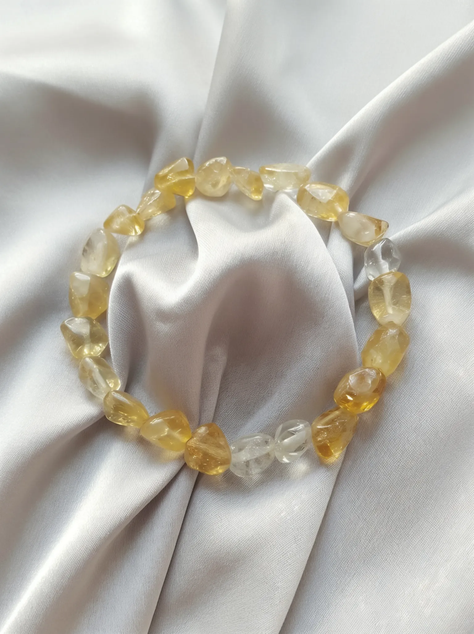 Bracelet placed on a fabric setting.