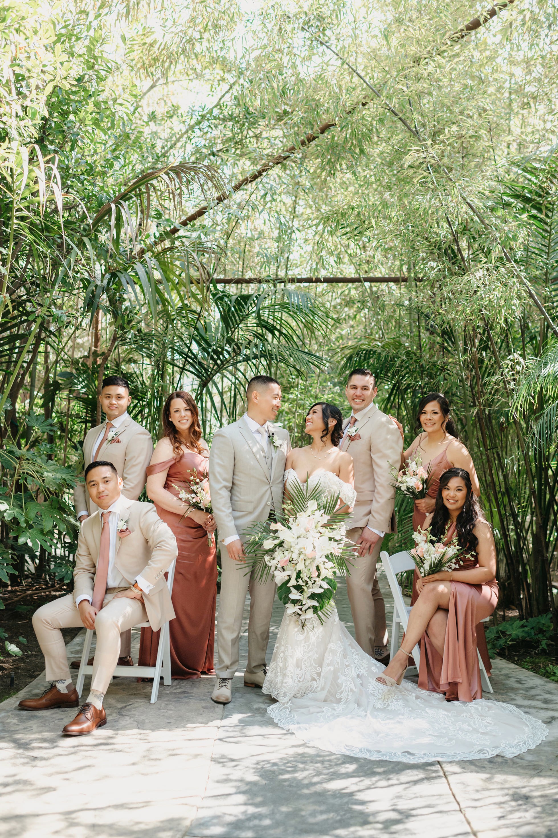 Flat lay wedding details with bouquet, rings, and sparkling bridal heels