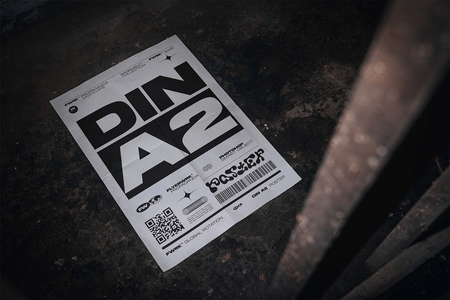 Basement A2 Poster Mockup showing a white paper design laid on a dusty concrete floor