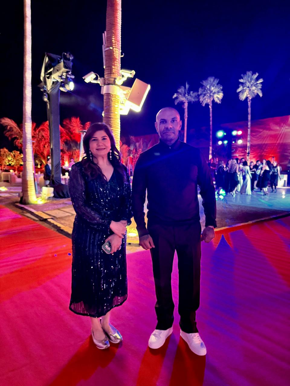 Tanu Chopra attending an outdoor evening event