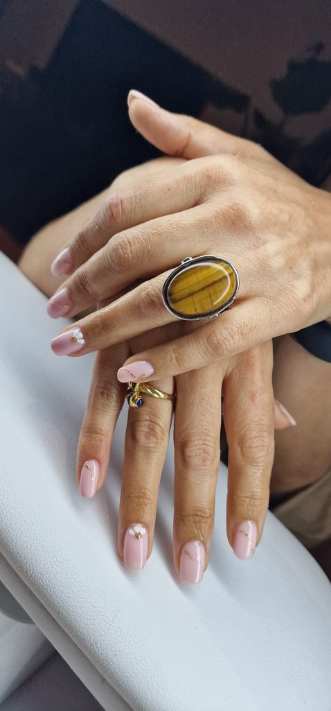 Woman selecting nail polish samples