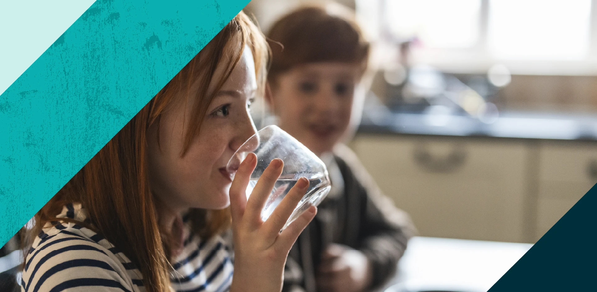 Little girl drinking glass of water