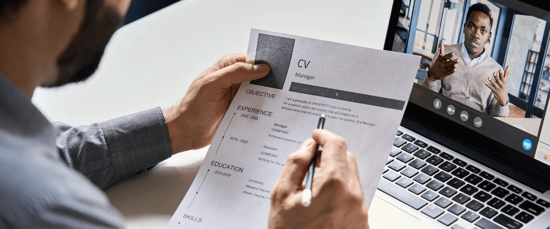 person checking CV - Best Job Boards for Software Engineers