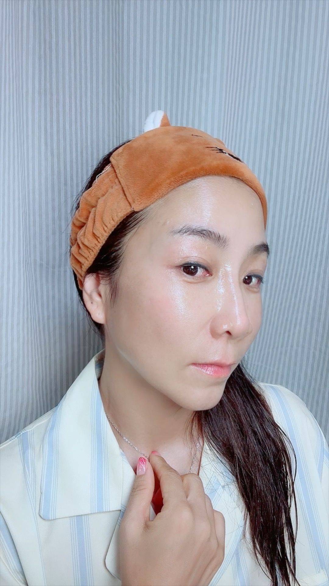 a man with a goatee smiles at the camera