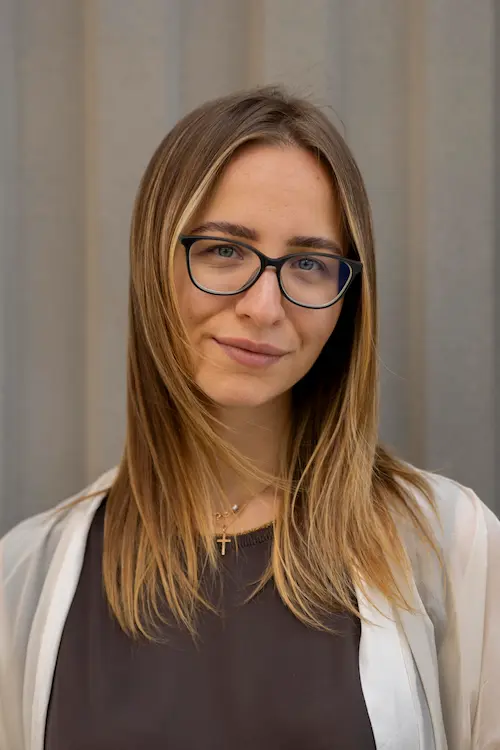  Photo of Anastasiia, Founder and RCIC, looking at the camera