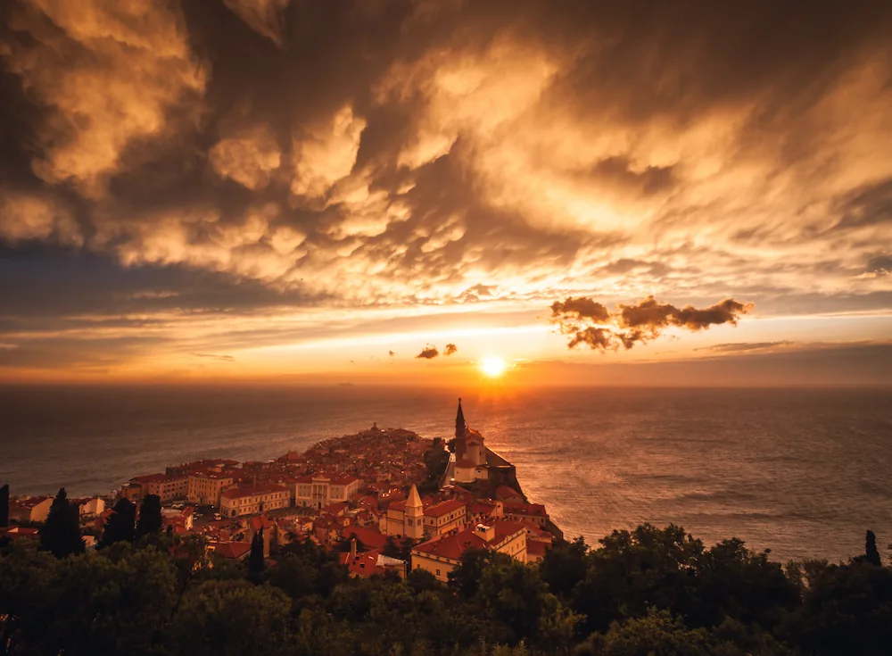 Colorful sunset over Piran on Slovenian coast