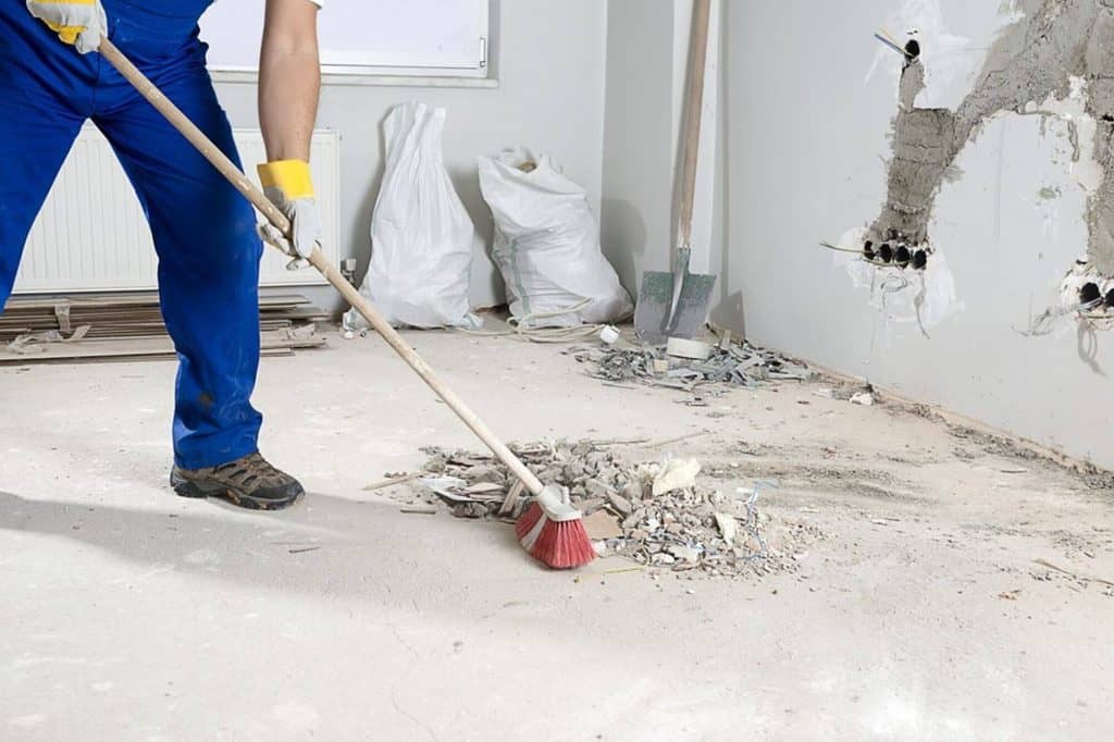 Evergleam cleaner sweeping building dust for after builders cleaning in Manchester