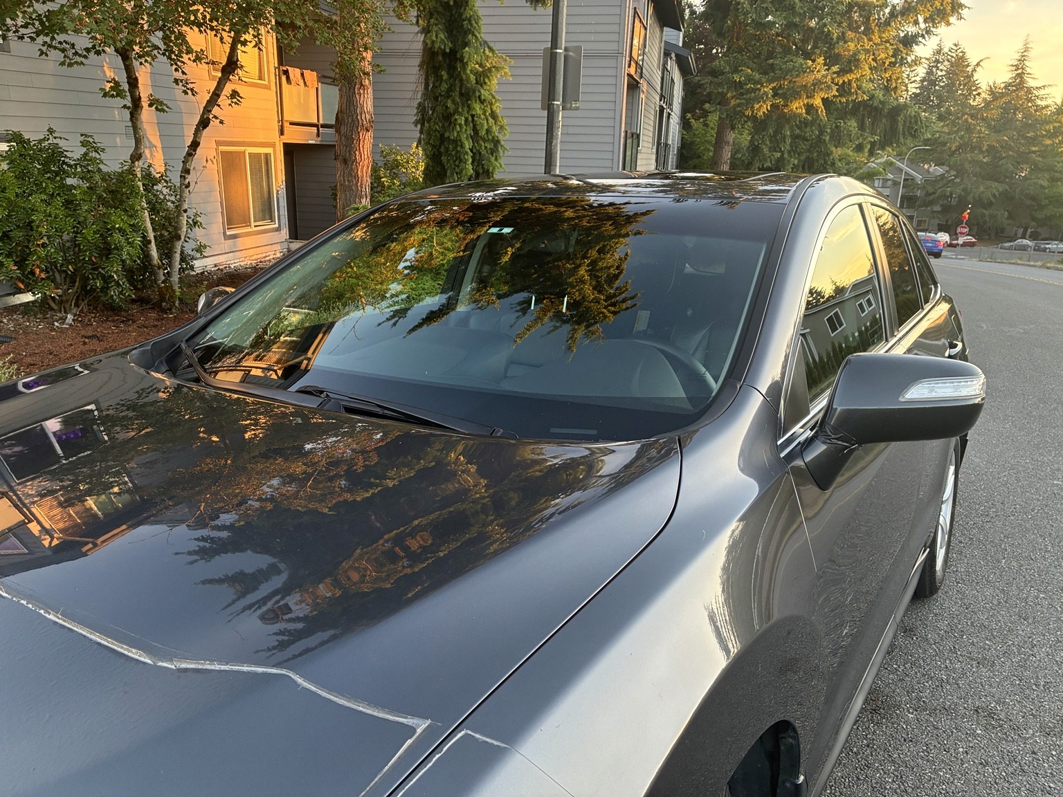 Finished Acura exterior with clear reflections after mobile detailing
