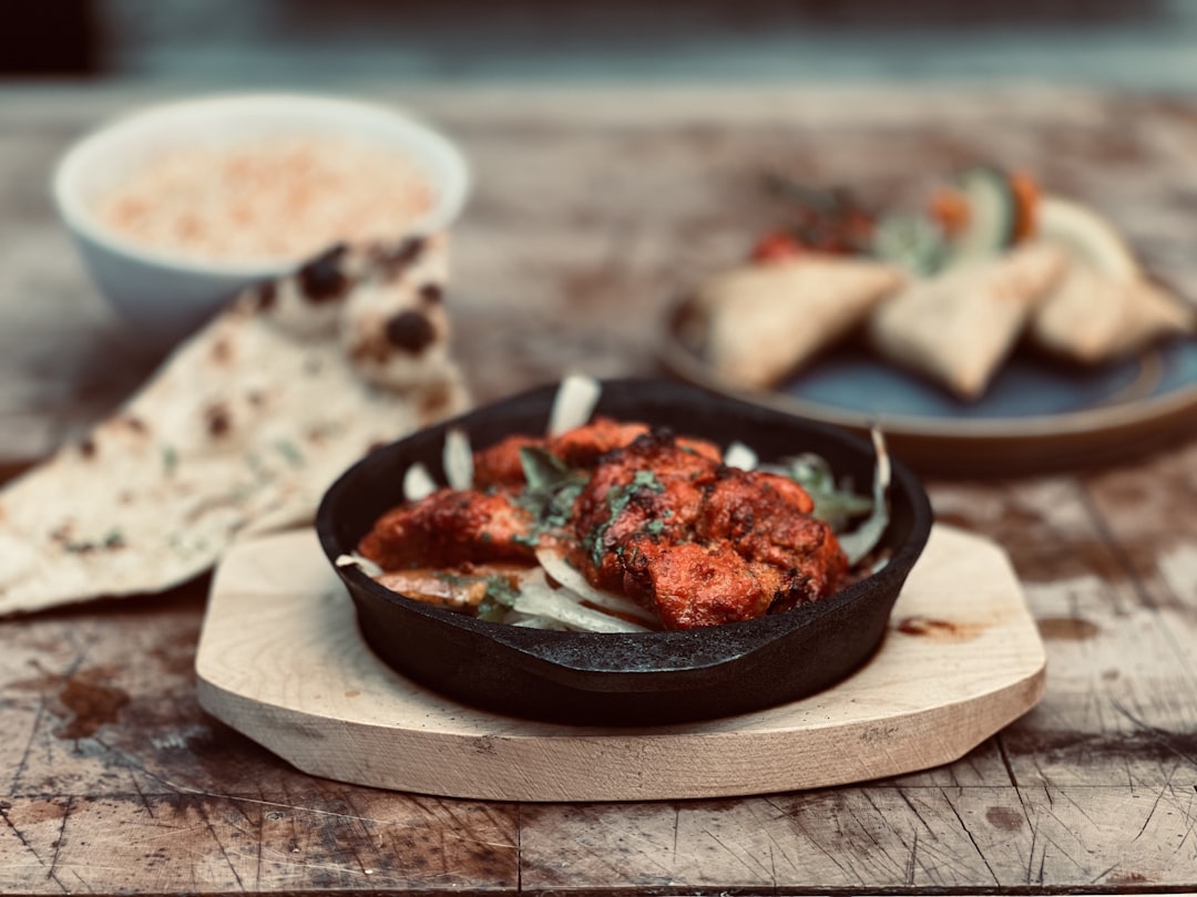 Indian food with naan, samosas, and rice