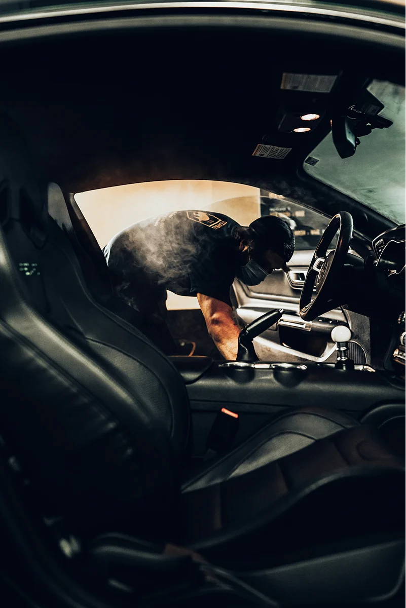 HyperAuto Care Interior Detailing service in a professional auto care workshop