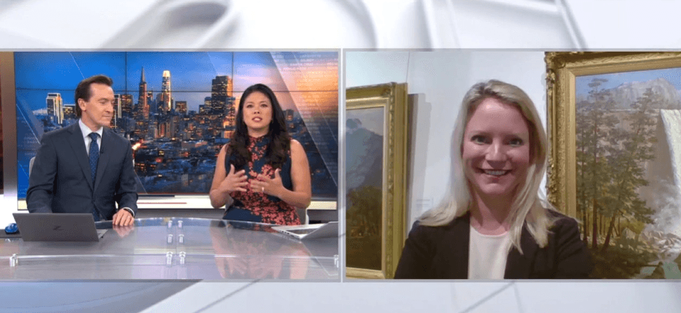 a close up of a necklace on a wooden plate