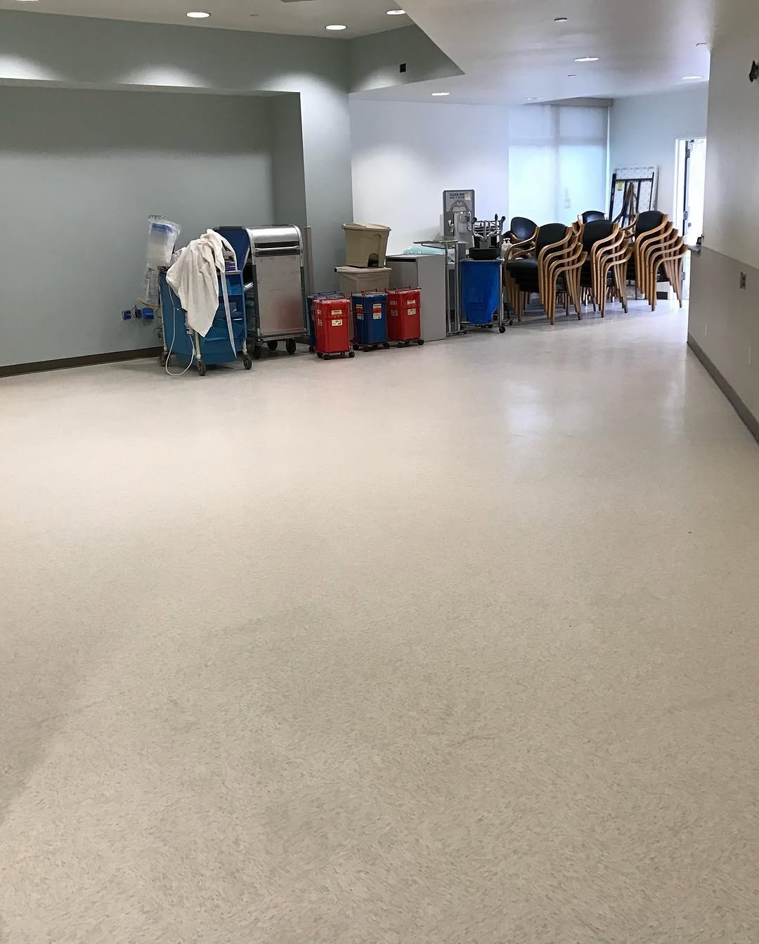 Completed break room floor in vinyl composition tile with furniture returned