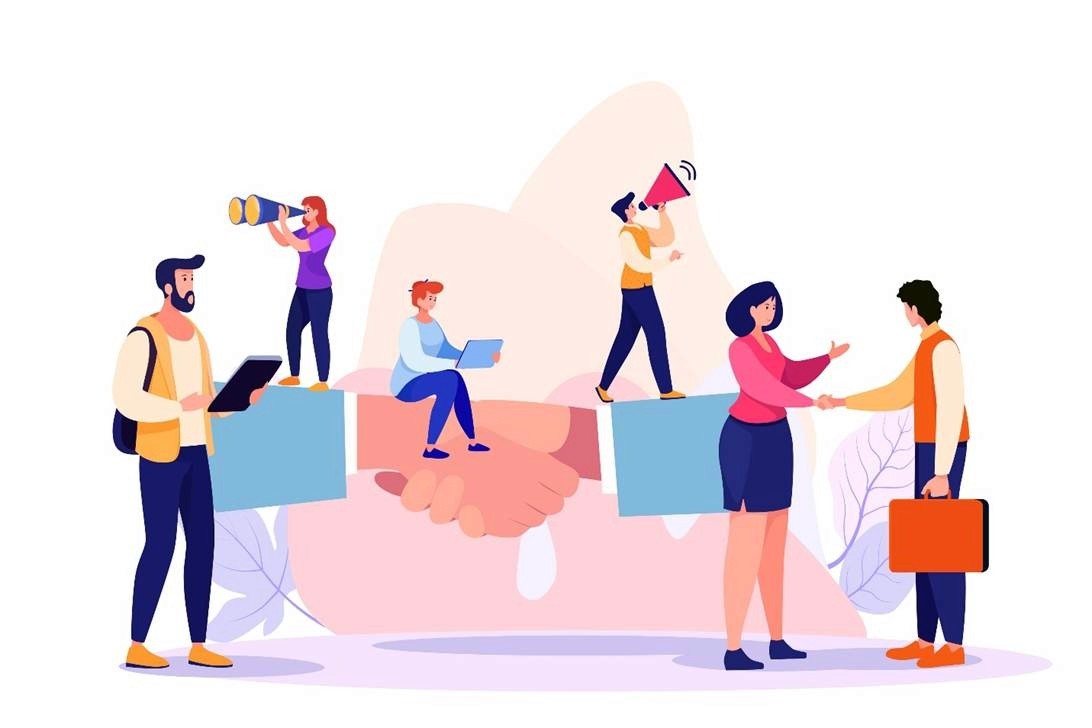 Illustrated team of marketers with megaphone and binoculars standing on a large brand partnership handshake
