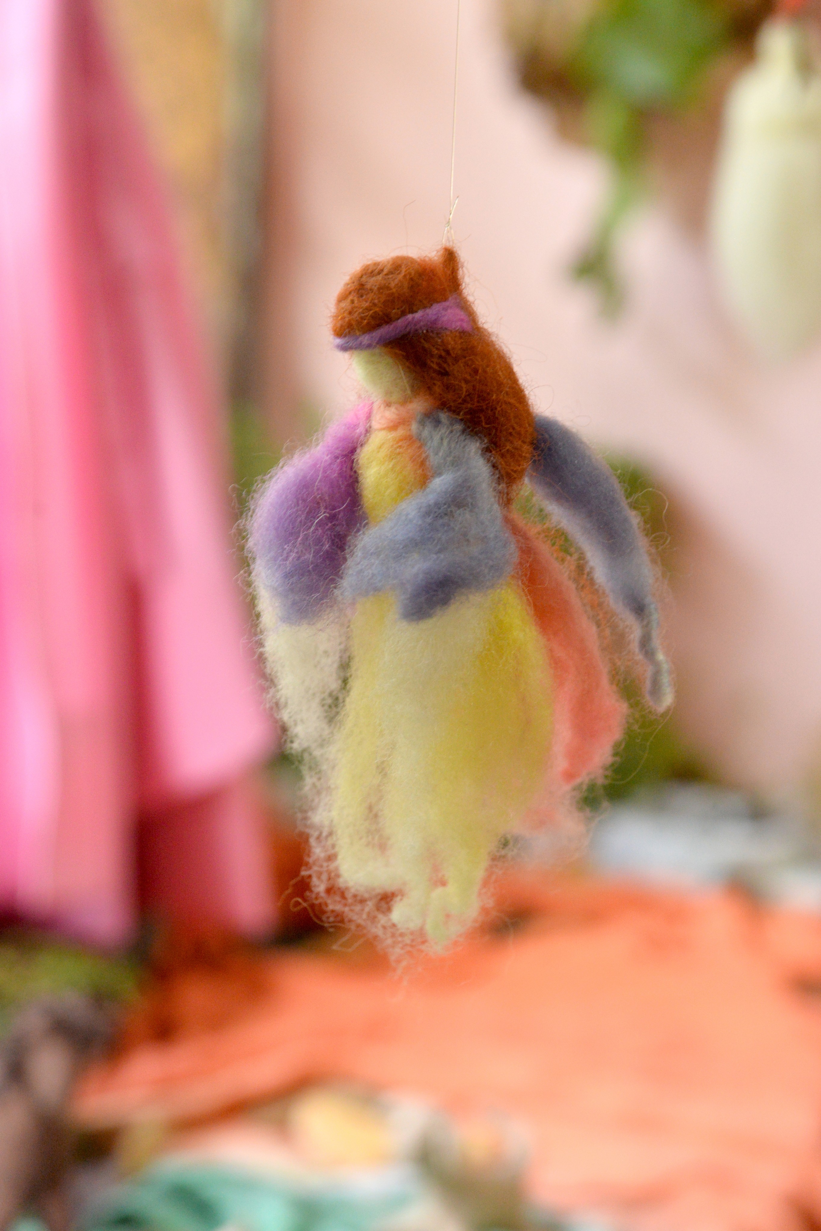 Close-up of a tree stump showing growth rings and a textured brown wood surface.