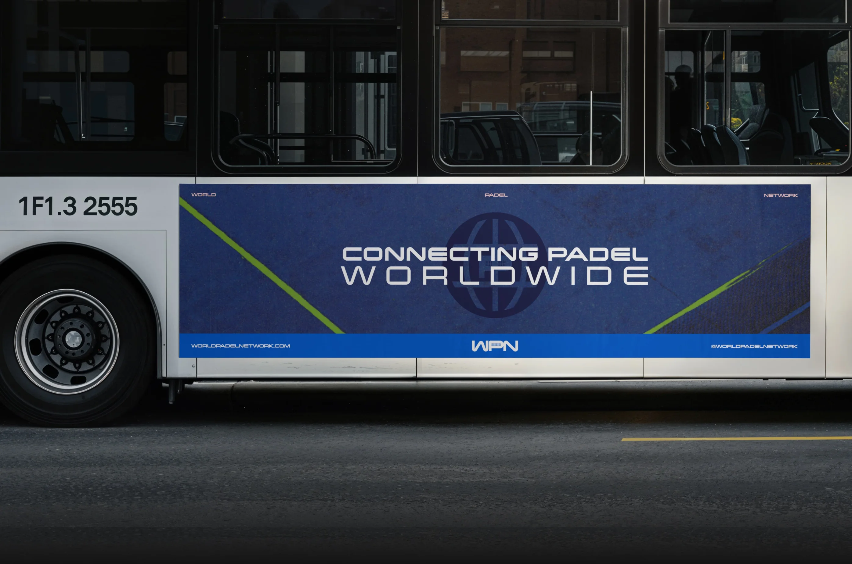 World Padel Network — WPN bus wrap with ‘Connecting Padel Worldwide’ headline — Transport advertising