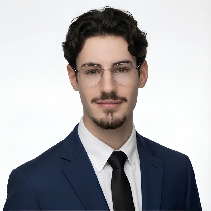 Interior of a cafe or workspace with several people at tables