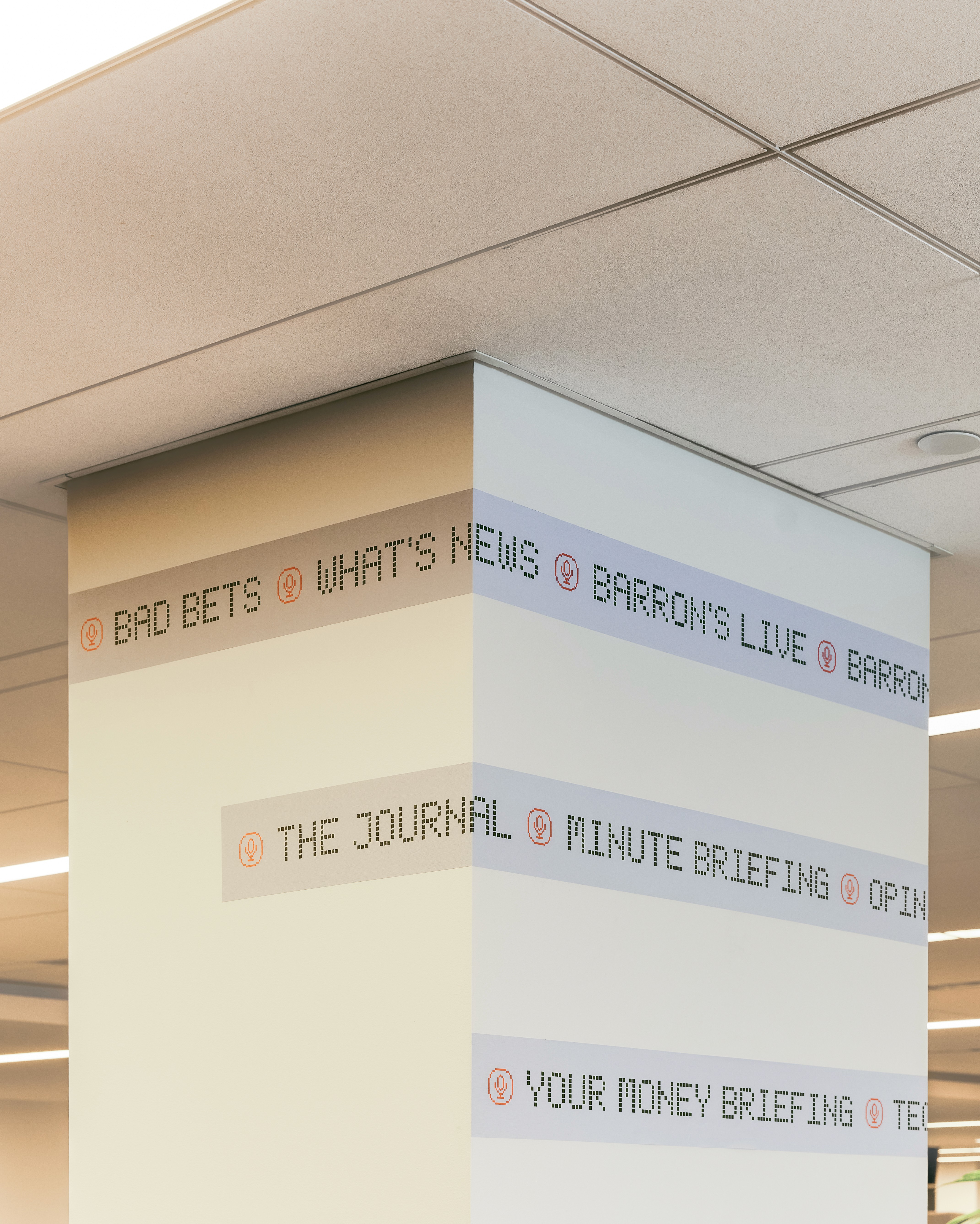 Streetside billboard with flyposters of the Batch.Works brand and illustrations