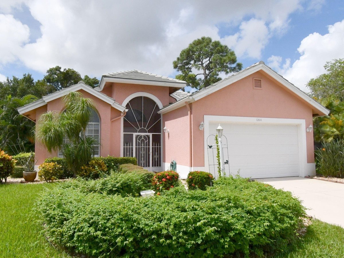2016 Roof Replacement in Marsh Landing, PGA Village, Port St Lucie with Entegra Flat Smooth Tile in Natural Gray