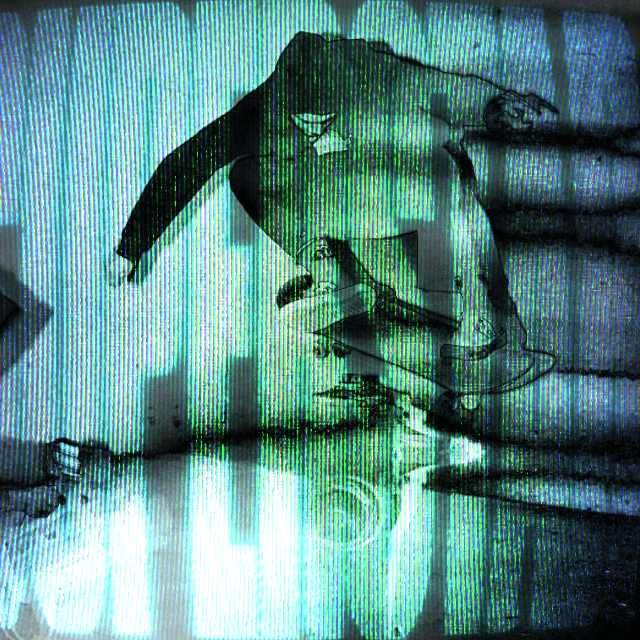 A skateboarder performs a trick on top of a fire hydrant