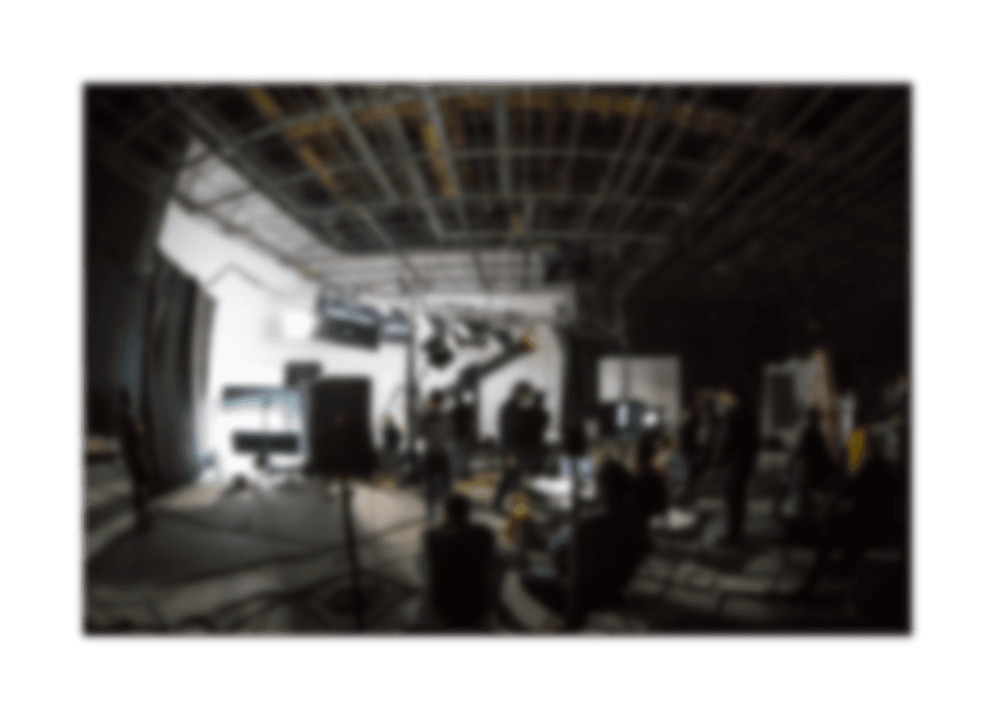 Group of people relaxing outdoors on a field or lawn