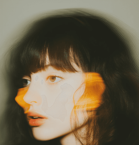 shallow focus photography of woman outdoor during day