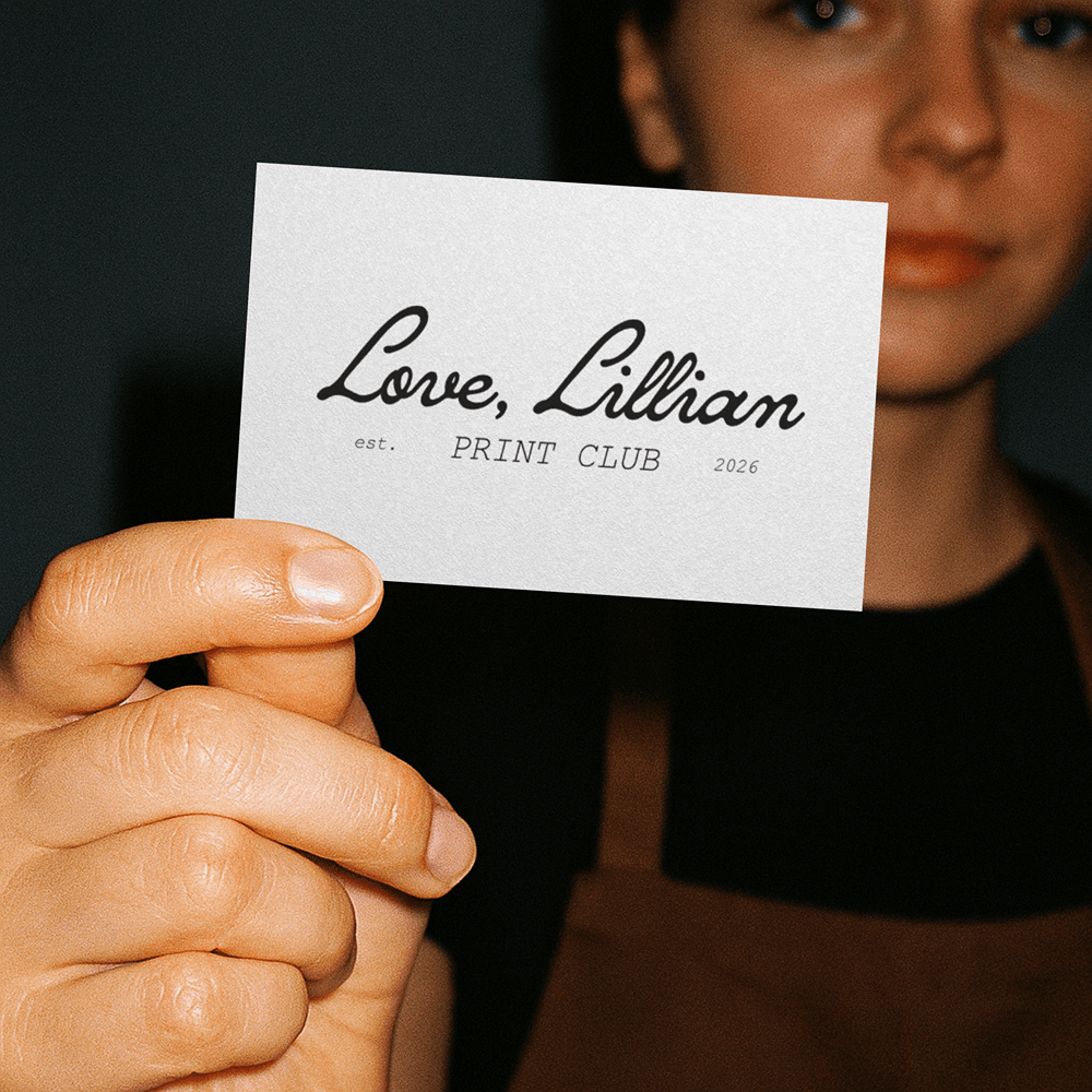 Business card mockup emphasizing the refined typography and intimate, print-forward identity.