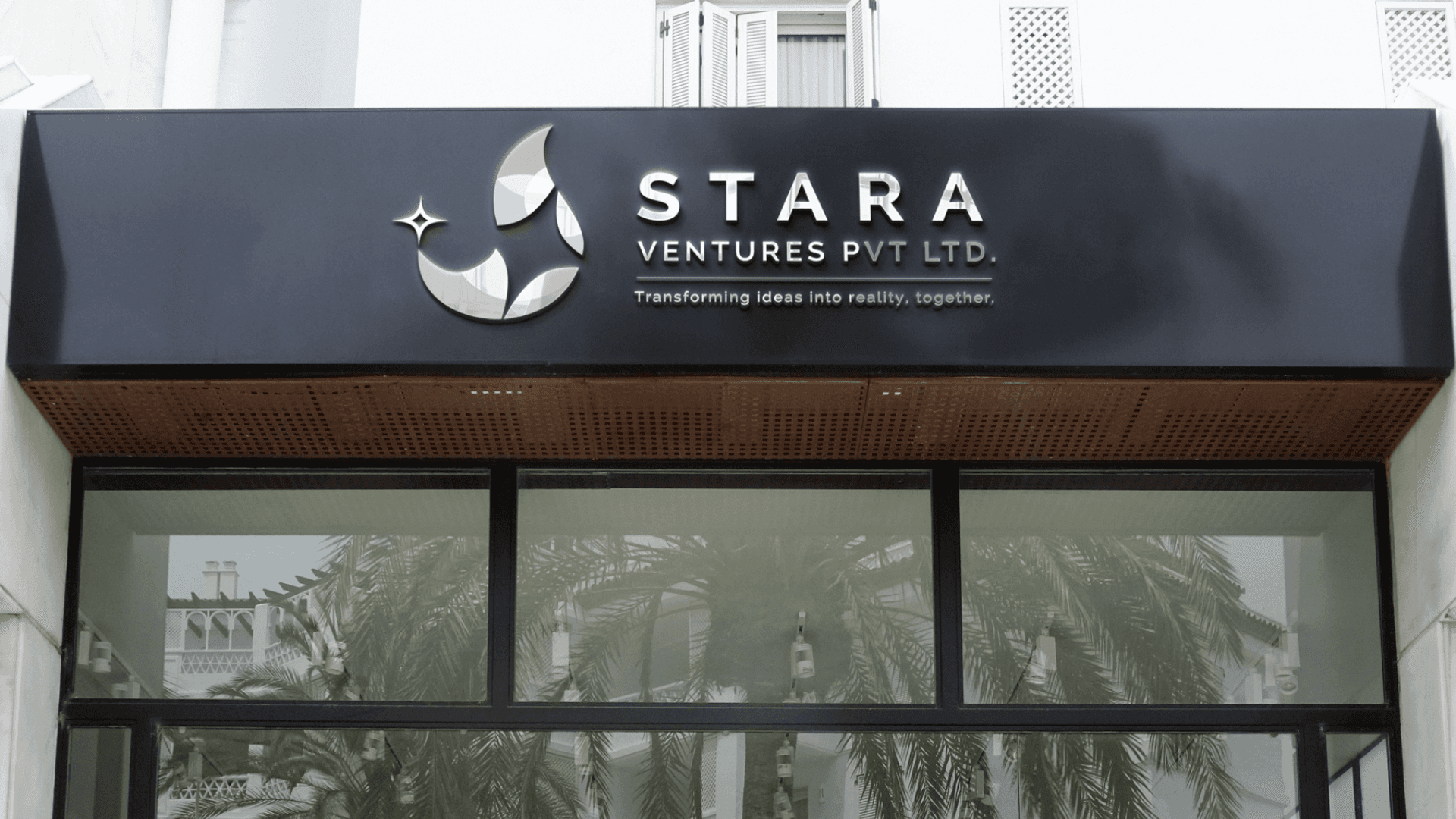 Stara Ventures brand identity applied to building signage — Penguincil Design