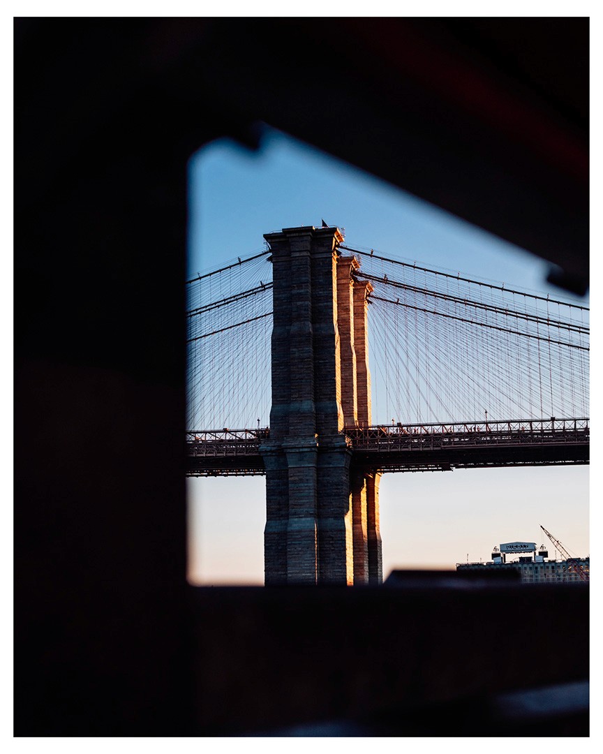 Photo of Brooklyn Bridge with a dark foreground Photography