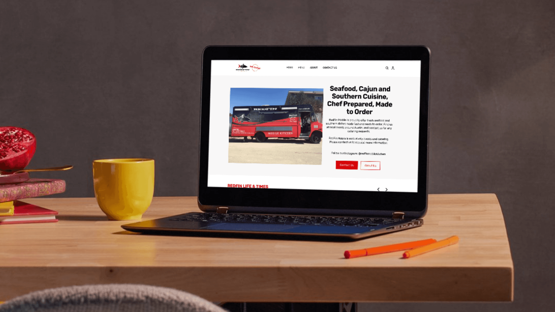 Stack of modern books and magazine with minimalist cover design on leather chair