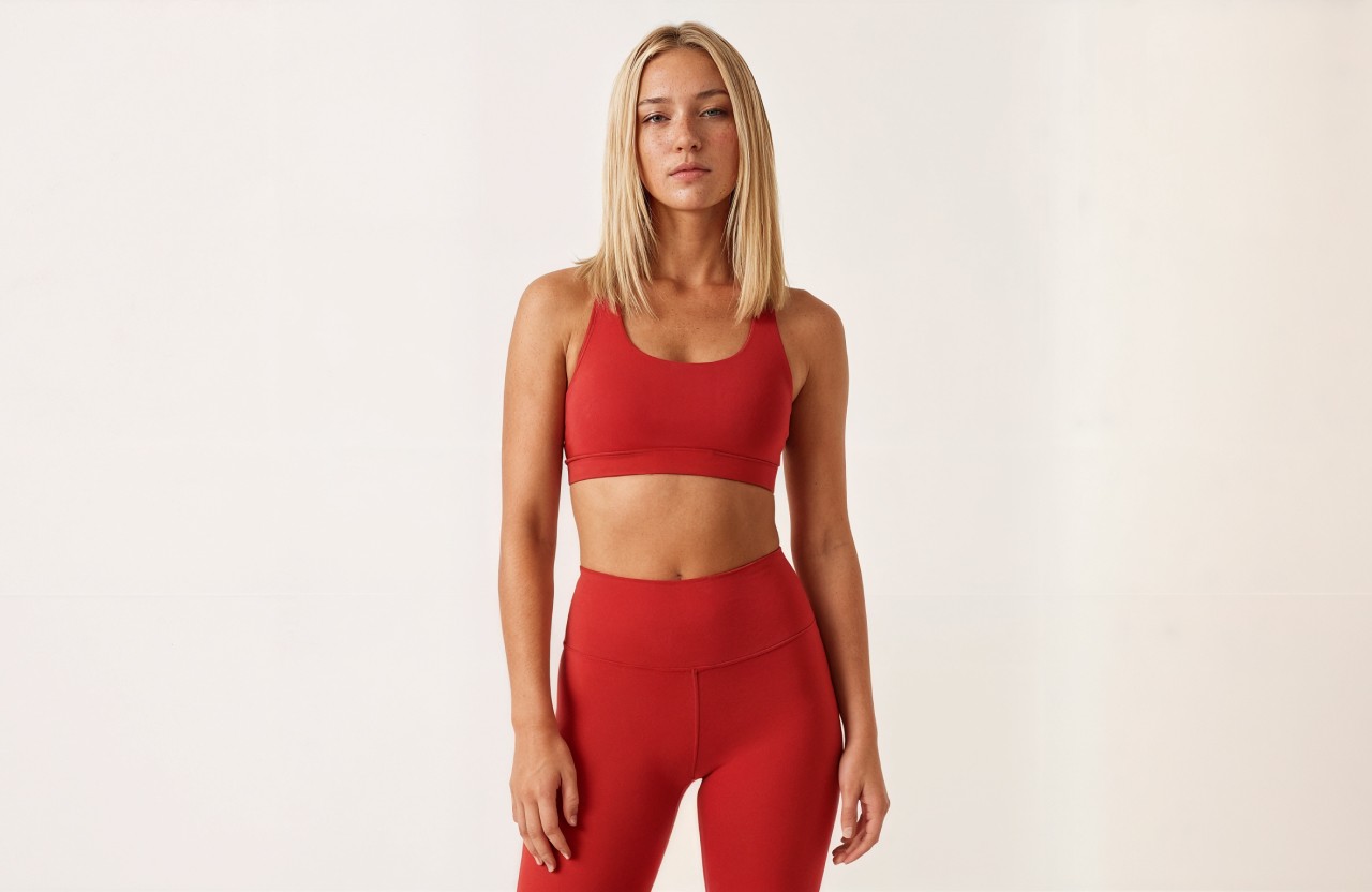 Rachel Stone standing with ABS and hands in her pockets