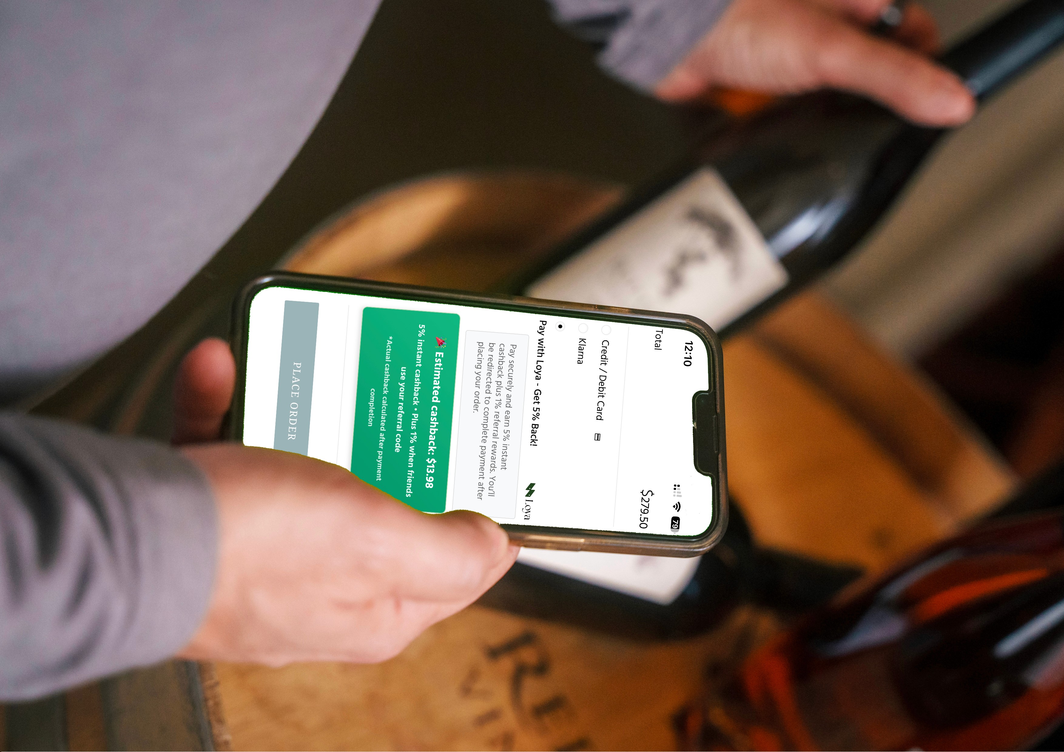 Checkout screen showing Loya as a payment option with a green icon, offering 5% instant cashback when paying with Loya, making the purchase cheaper like a discount.