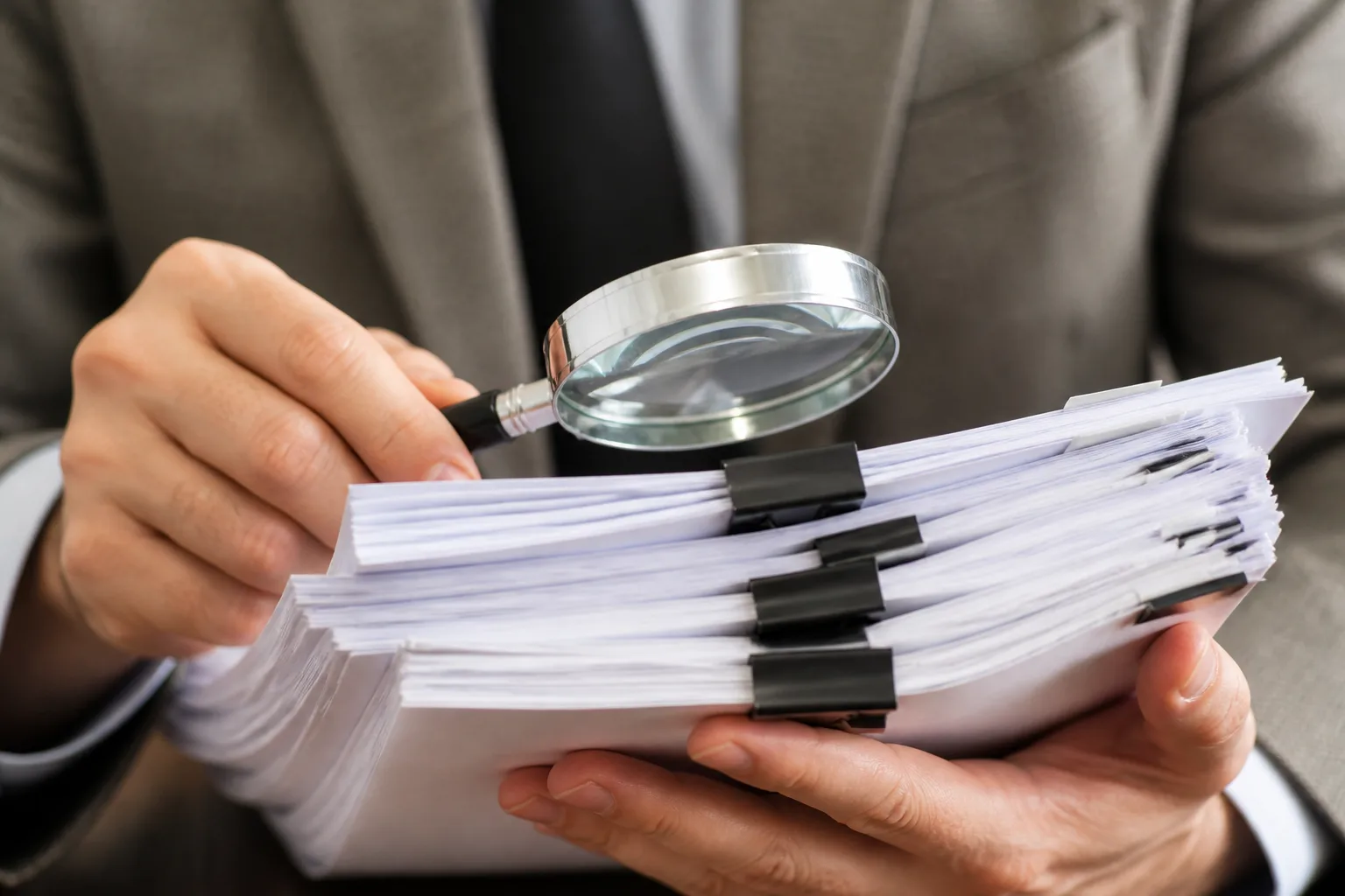 Audit Documents for a Dubai Company beside a tax filing dashboard and a document checklist