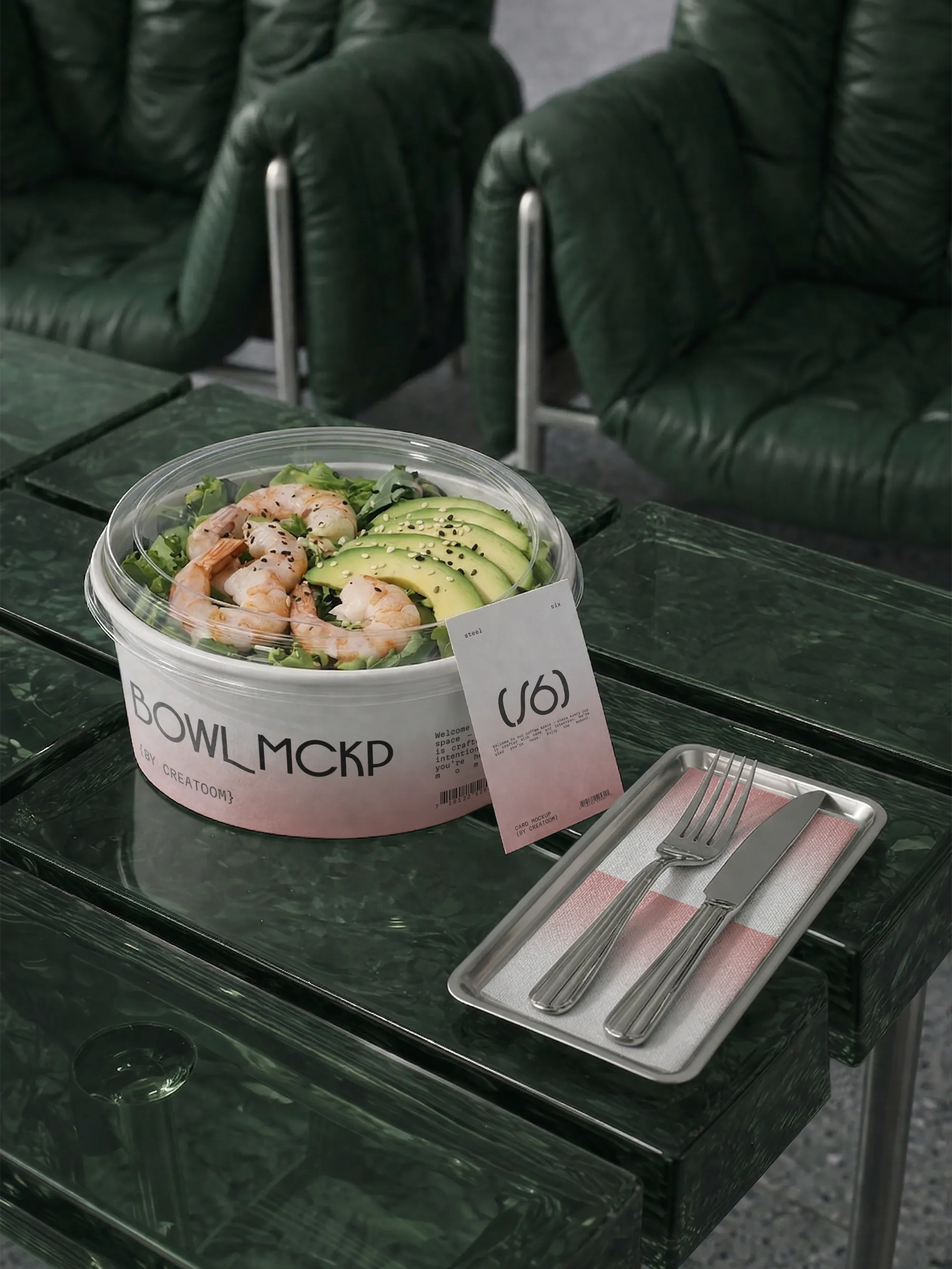 Prawn and avocado salad bowl with a branded tag and cutlery