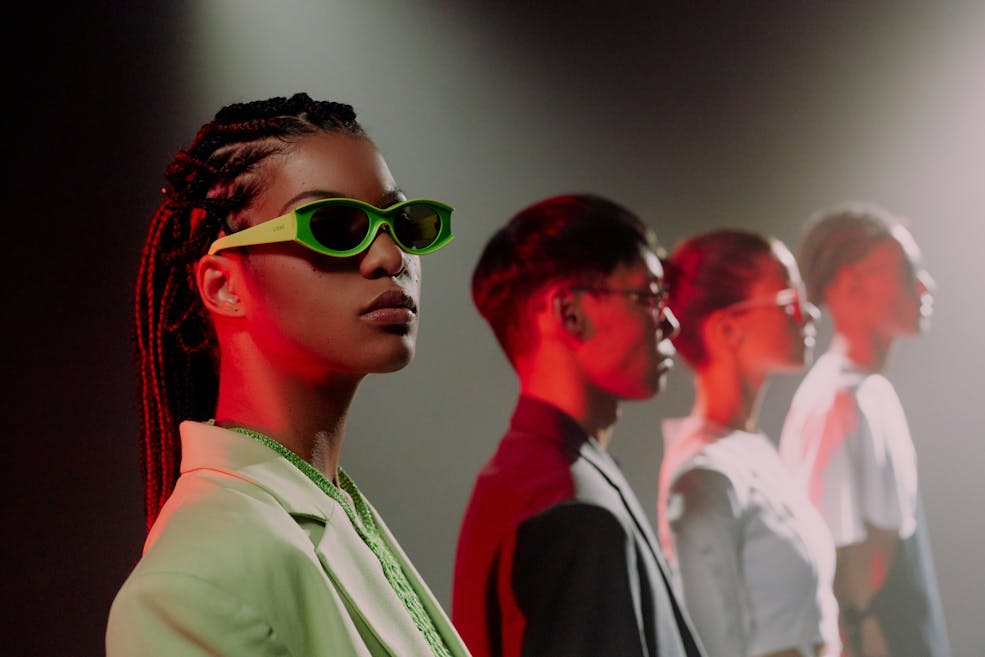 Stylish people wearing large sunglasses