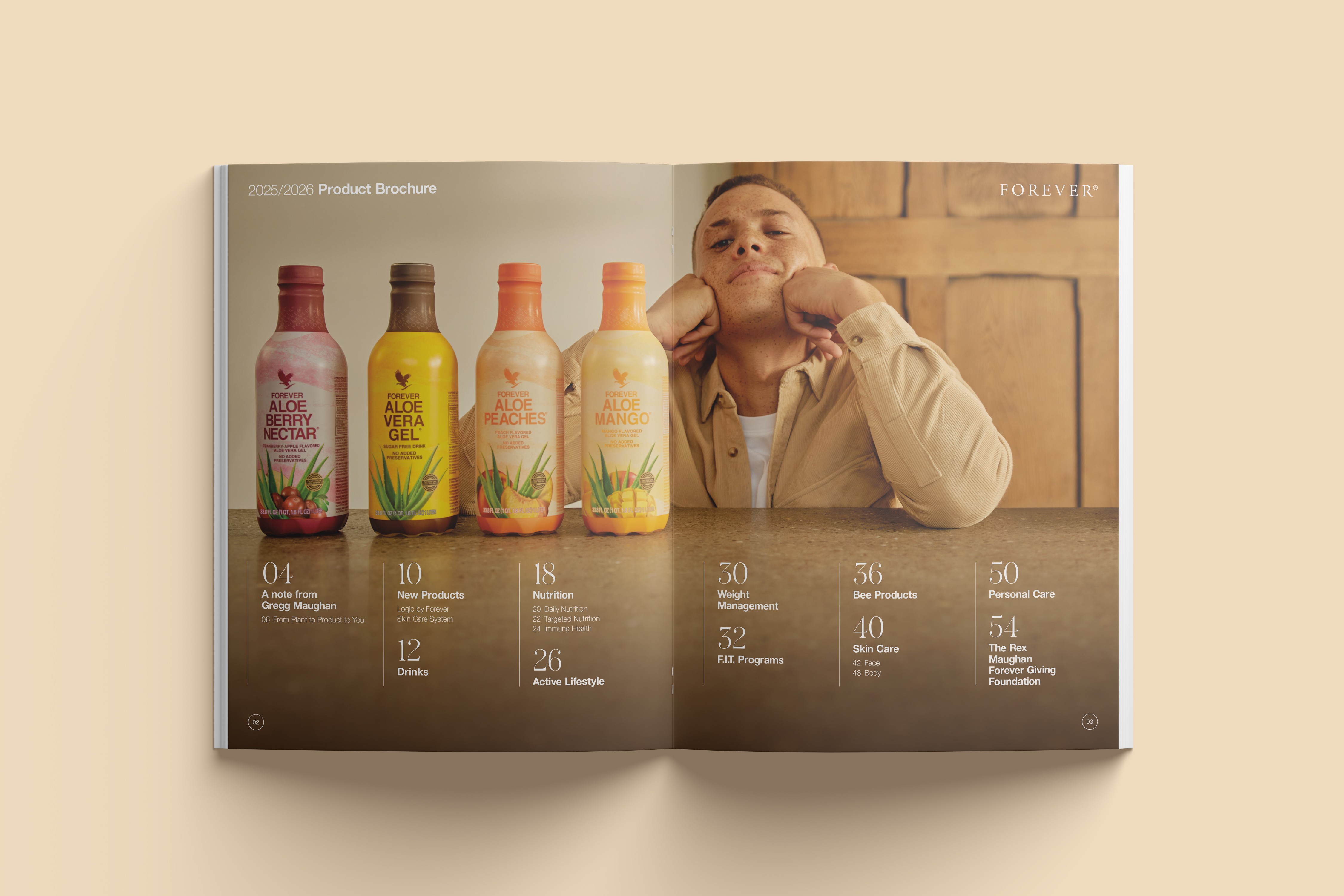 Double-page product brochure design for Forever Living, showcasing the Aloe Vera drinks range with large male image in the background.