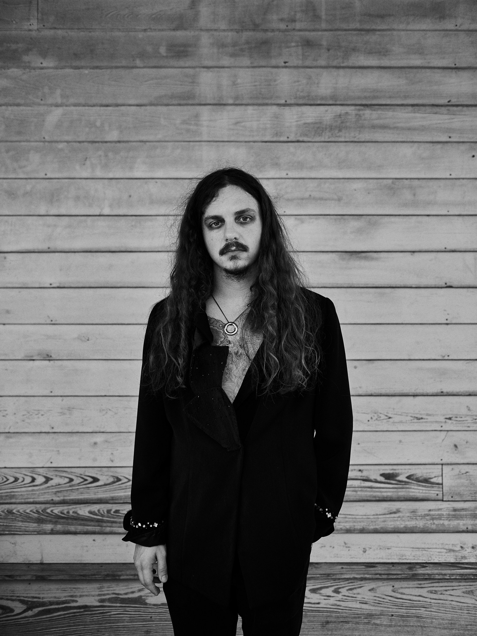Black and white portraits of young alternative, romantic, goth, freak, punk and metal character against a textured New Orleans backdrop. 