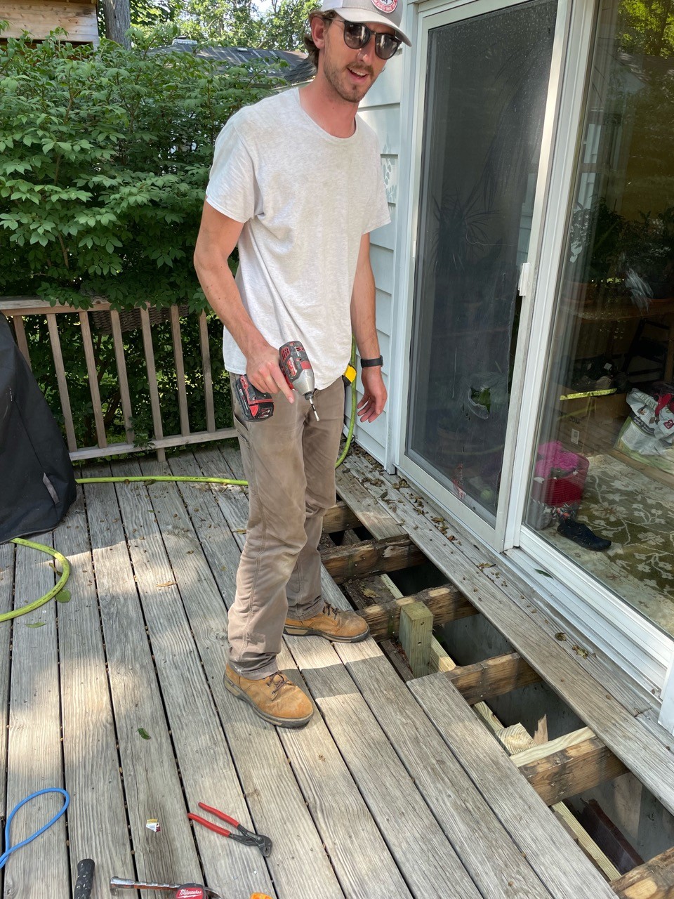 Cary Home Improvement crew member at work on a home exterior