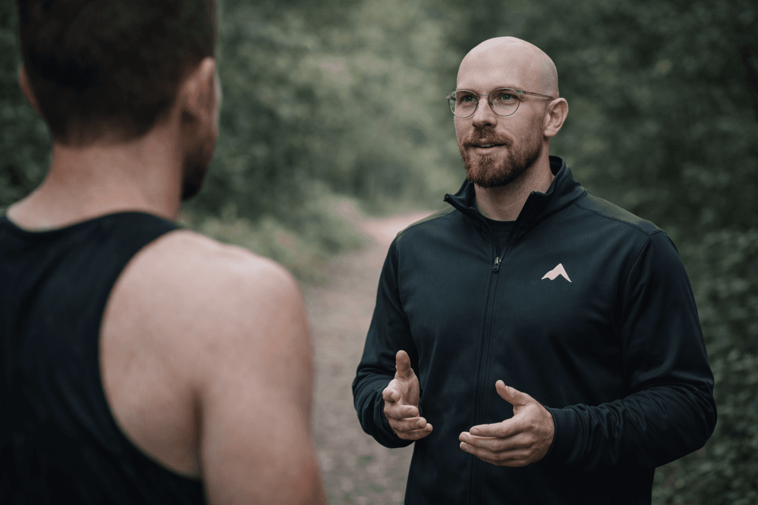 Coach explaining something to an athlete