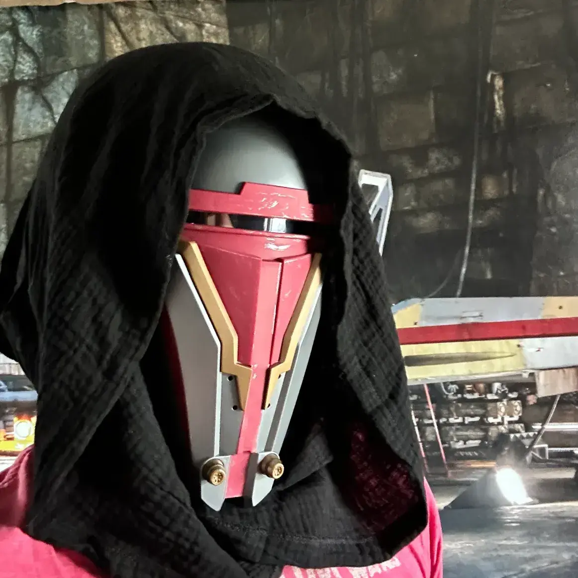 Jared wears a detailed Revan mask for the first time, capturing the intense and mysterious look of the legendary Star Wars character. The mask’s intricate design and dark visor make for an impressive and intimidating appearance.