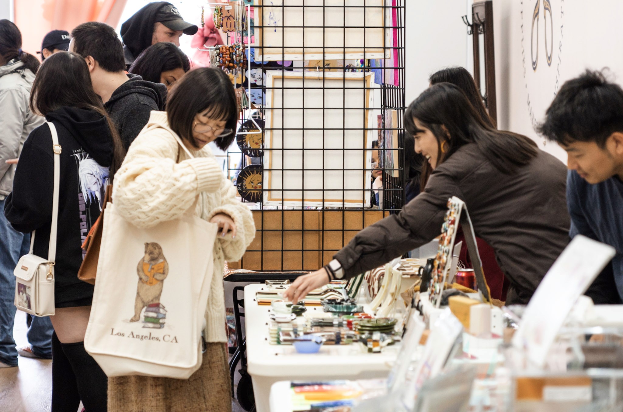 Branding collage for 'delivo' food delivery, featuring logo, slogan, merchandise, and app design.