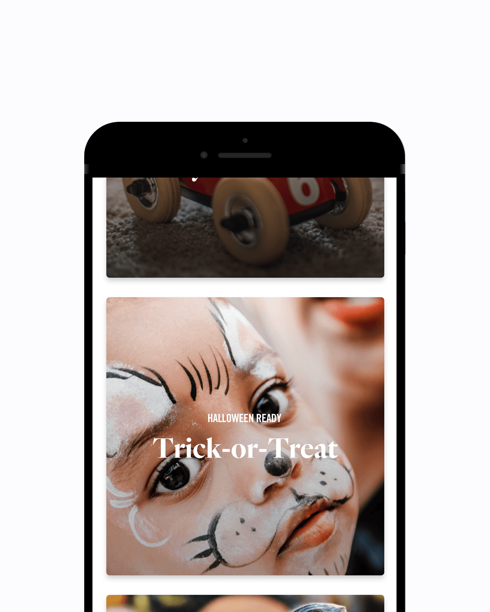 A phone mockup pairs a toy car close-up with a Trick-or-Treat content card, part of the campaign's in-app Halloween content.
