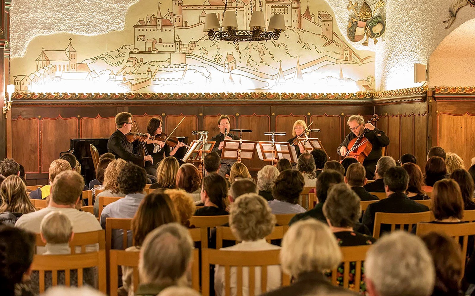 Musicians performing Mozart at Fortress Hohensalzburg concert hall in Salzburg, Austria.