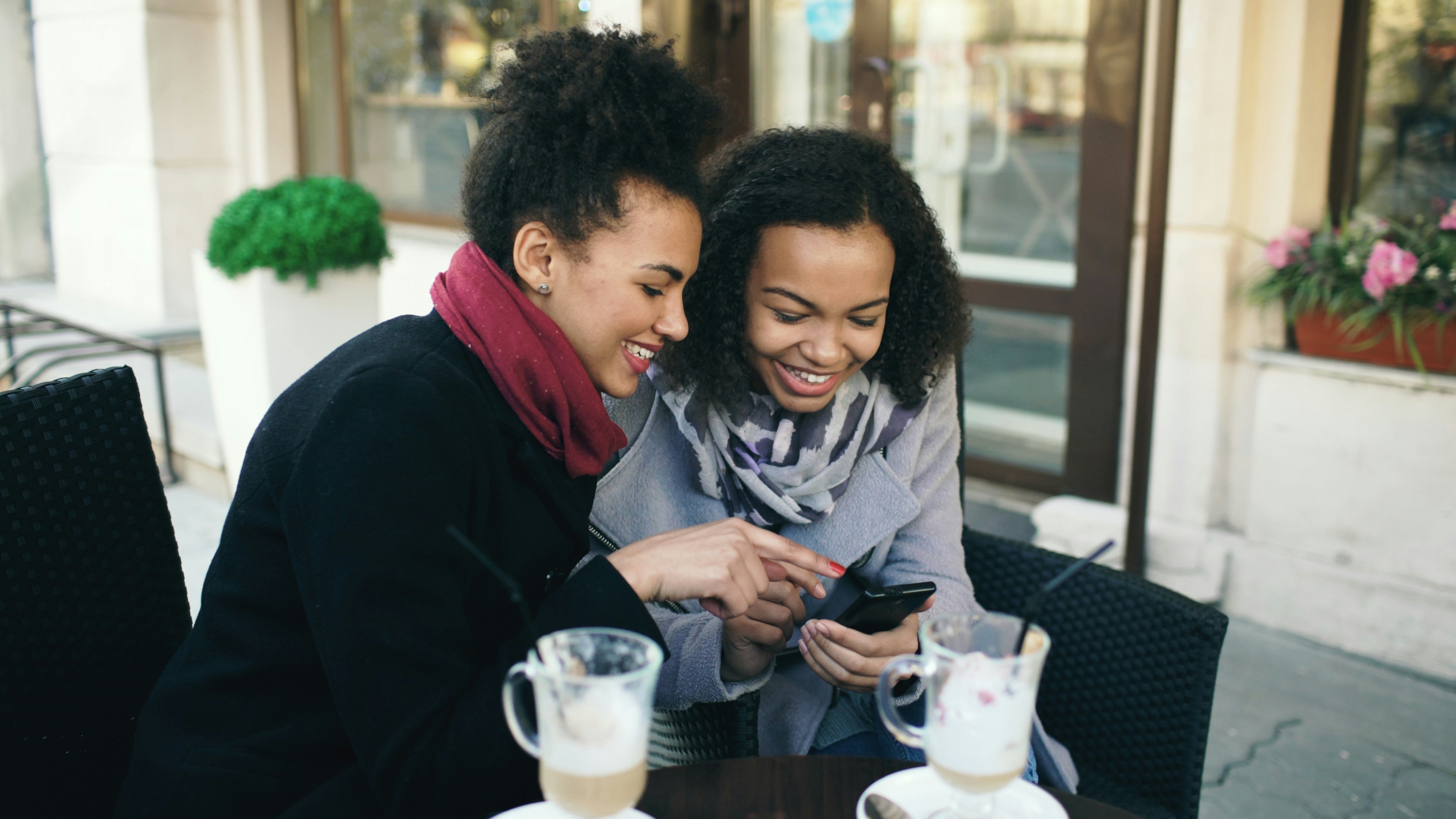 2 women in cafe